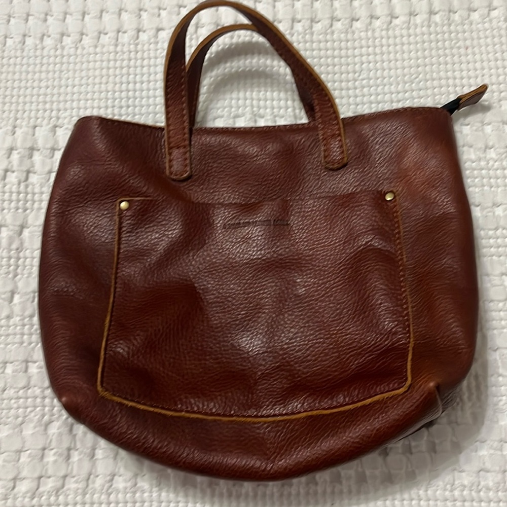 Portland Leather tote with crossbody strap.  NEVER used.  Perfect condition.